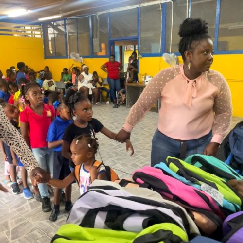 Students waiting in line to receive their Back-to-School Packages