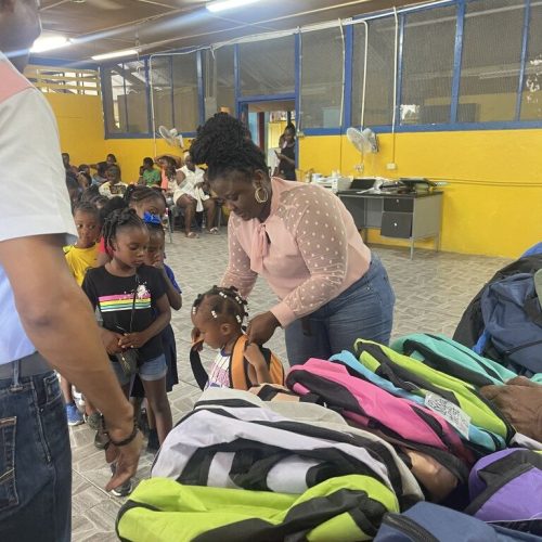 Love of Hearts Foundation Back to School Drive 2025 students receiving their bag packs.